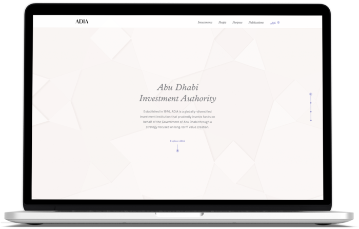 阿布扎比投资局:New homepage of the Abu Dhabi Investment Authority website design shown on a laptop screen.